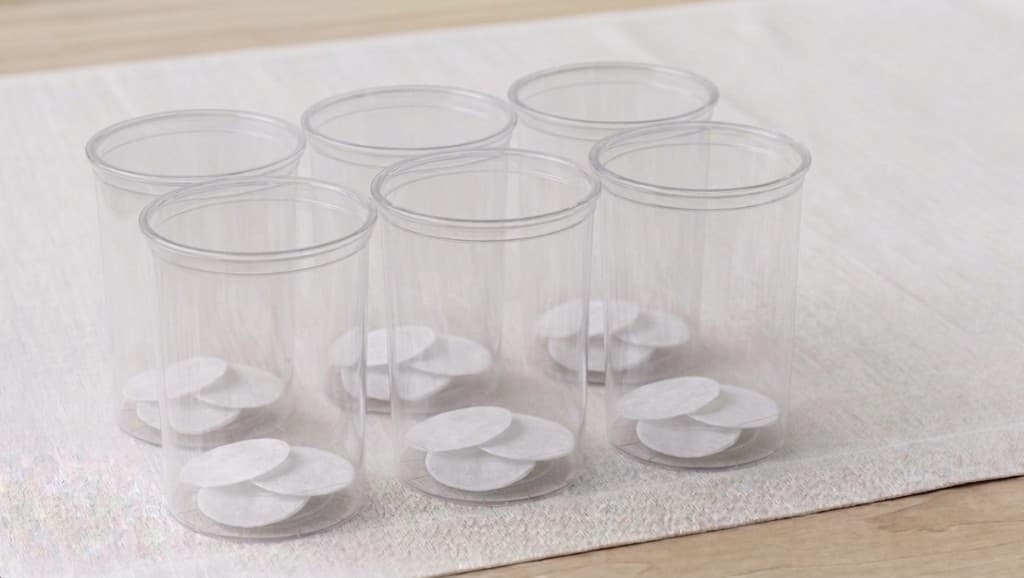 Six 32 oz fruit fly culture cups with vent pads